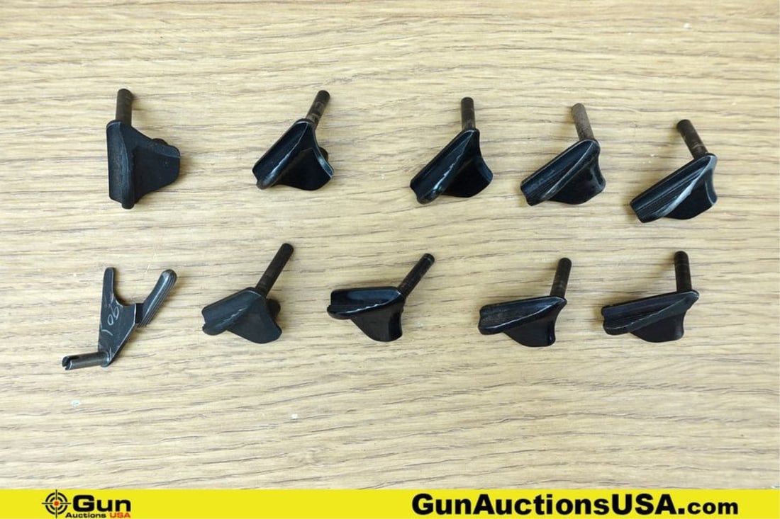 1911 Gun Parts. Good Condition. Ten Assorted 1911 Thumb Safeties.. (76665) (GSCM65): 1911 Gun Parts. Good Condition. Ten Assorted 1911 Thumb Safeties.. (76665) (GSCM65)