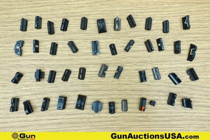 Gun Parts. Good Condition. Forty-Four Assorted Front and Rear Pistol Sights.. (76661) (GSCM58)