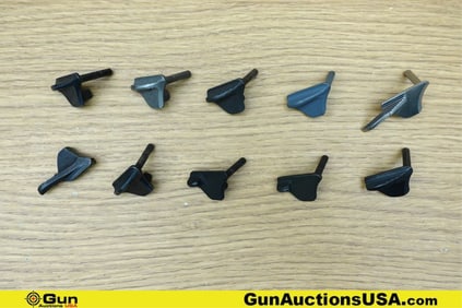 1911 Gun Parts. Good Condition. Ten Assorted 1911 Thumb Safeties.. (76663) (GSCM22)