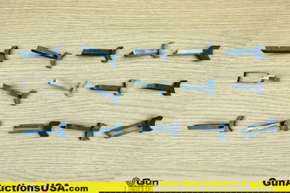 1911 Gun Parts. Good Condition. Fifteen Assorted 1911 Triggers.. (76645) (GSCM52)