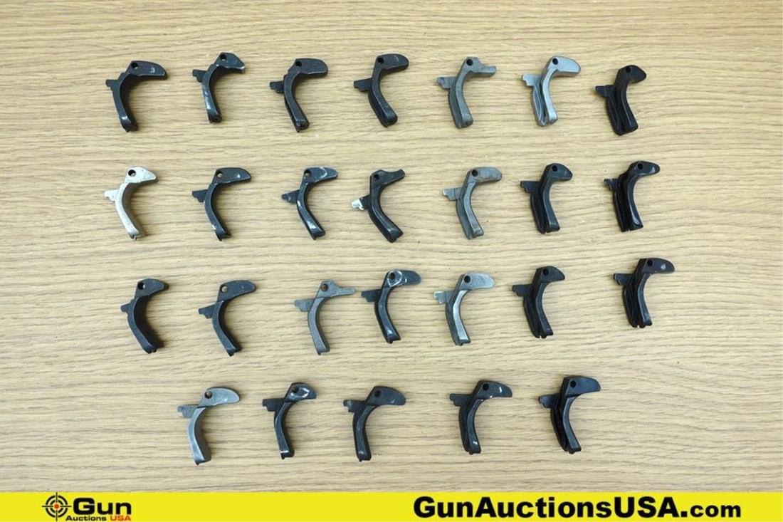 1911 Gun Parts. Good Condition. Twenty-Six Assorted 1911 Backstrap Safeties.. (76640) (GSCM63): 1911 Gun Parts. Good Condition. Twenty-Six Assorted 1911 Backstrap Safeties.. (76640) (GSCM63)