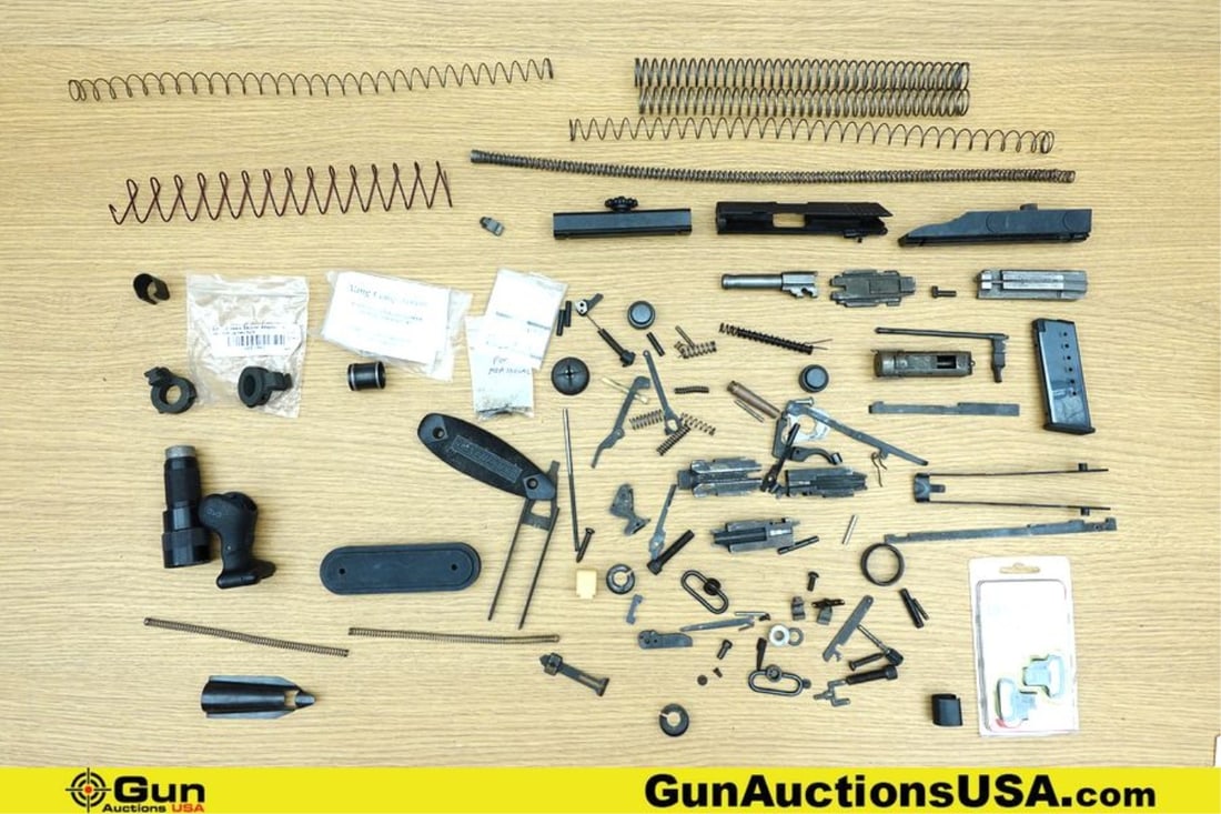 Crimson Trace, Uncle Mike's, Sure Fire, Etc. Laser, Gun Parts, Etc. . Good Condition. Assorted Gun: Crimson Trace, Uncle Mike's, Sure Fire, Etc. Laser, Gun Parts, Etc. . Good Condition. Assorted Gun Parts and One Crimson Trace Grip Laser for Glocks. . (77013) (GSCM37)