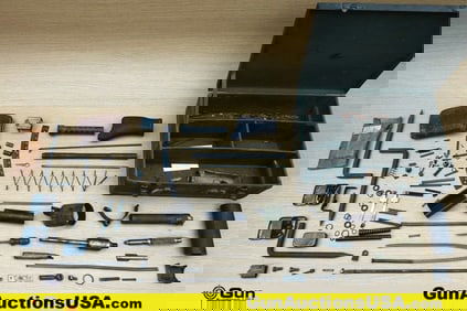 Military Surplus COLLECTOR'S Gun Parts, Etc. . Good Condition. Assorted Gun Parts and Tools in a
