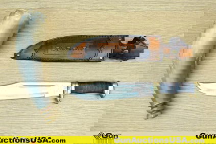 KA-BAR, Etc. Lumberjack, Etc. Knife, Black Powder Horn. Good Condition. One Natural Carved Powder