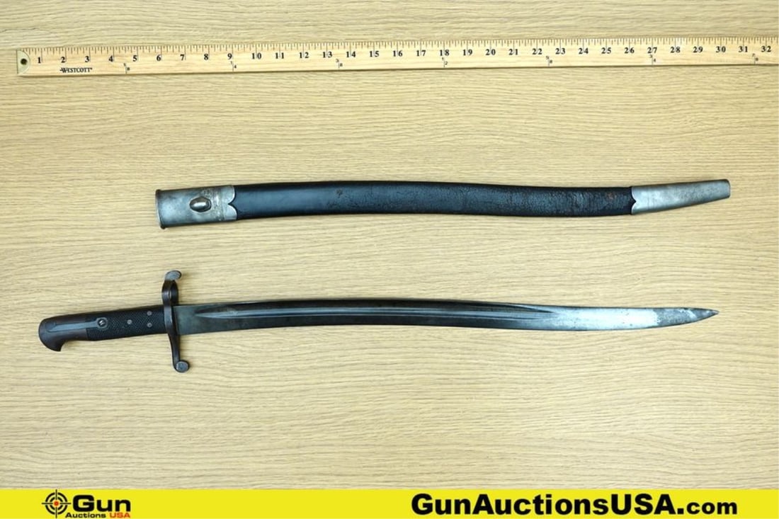 BRITISH ENFIELD P1860 COLLECTOR'S Bayonet. Good Condition. One Enfield Bayonet features overall: BRITISH ENFIELD P1860 COLLECTOR'S Bayonet. Good Condition. One Enfield Bayonet features overall length 28" and Blade length 22 3/4". Has checkered Bakelite Grip Panels. Steel Hand Guard with Barrel Lo