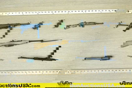 Grenade and Gun Replicas. Very Good. Three- Miniature INERT Grenade Replicas and Five Miniature WWII
