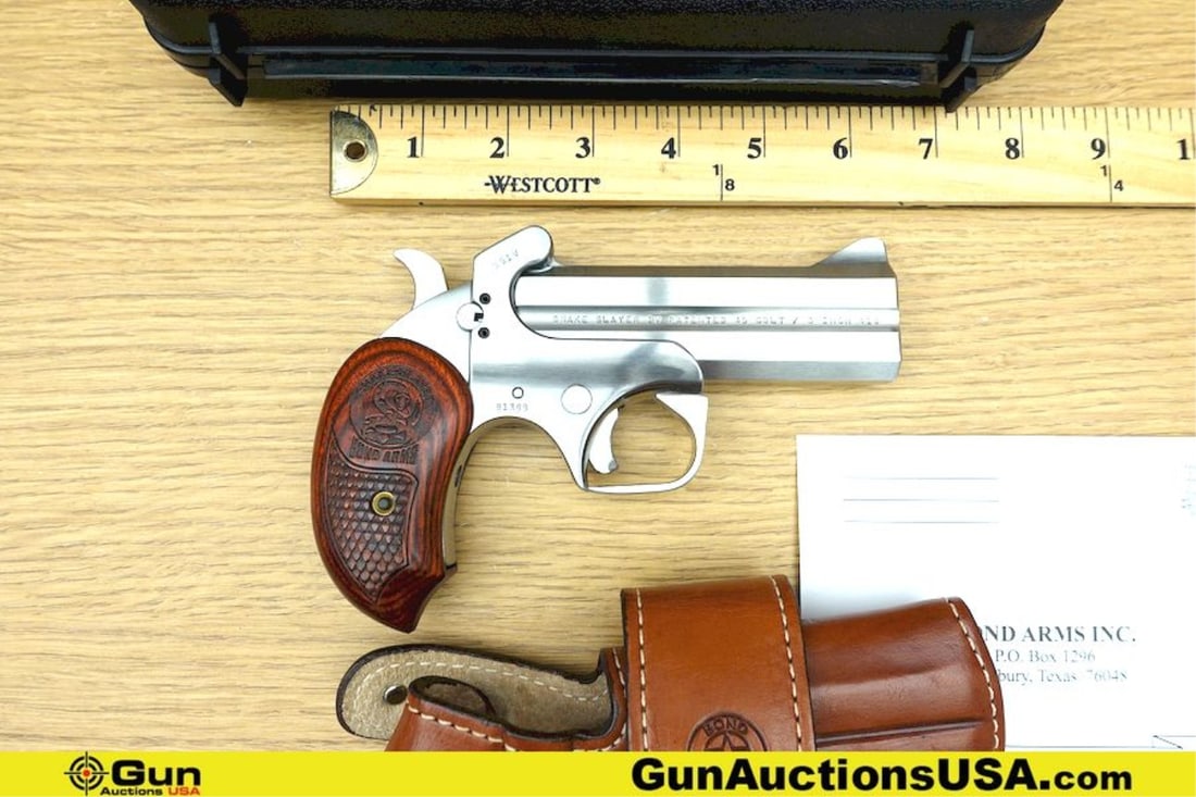 Bond Arms SNAKE SLAYER IV .45 COLT/.410 GA. Pistol. Very Good. 4.25" Barrel. Shiny Bore, Tight: Bond Arms SNAKE SLAYER IV .45 COLT/.410 GA. Pistol. Very Good. 4.25" Barrel. Shiny Bore, Tight Action Derringer Features Slab Side Barrels, Auto Eject, Textured Straight Grained Wood Grips with Bond A