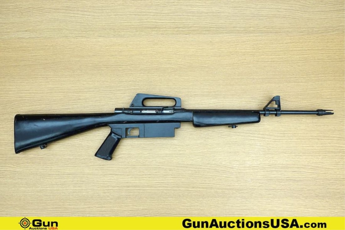 TAICO MODEL 16 .22 LR Rifle. Good condition, Normal Handling Marks, Scattered Spotting and/or: TAICO MODEL 16 .22 LR Rifle. Good condition, Normal Handling Marks, Scattered Spotting and/or Pitting. 18" Barrel. Shiny Bore, Tight Action Semi Auto Features Straight Grained Wooden Stock, Polymer Bu