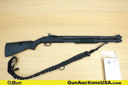 Mossberg 590 12 ga. Shotgun. Good condition, Normal Handling Marks, Scattered Spotting and/or