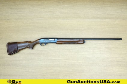 REMINGTON 1100 20 ga. Shotgun. Good condition, Normal Handling Marks, Scattered Spotting and/or