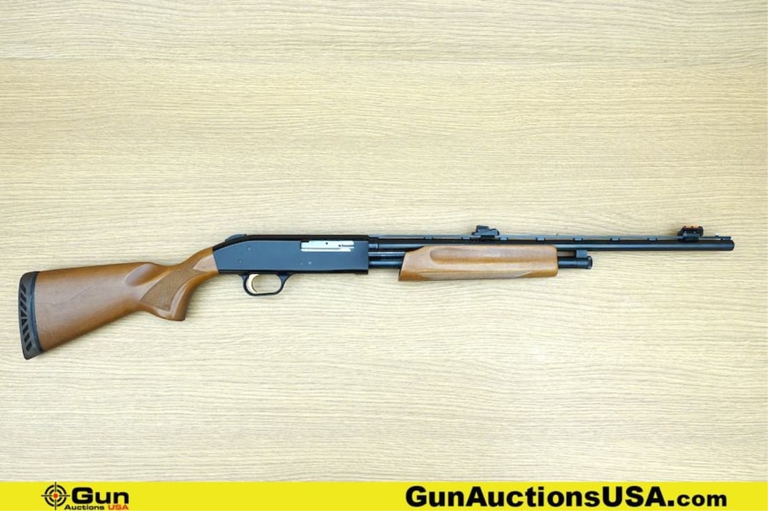 Mossberg 505E 410 GA Shotgun. Good condition, Normal Handling Marks, Scattered Spotting and/or: Mossberg 505E 410 GA Shotgun. Good condition, Normal Handling Marks, Scattered Spotting and/or Pitting. 20" Barrel. Shiny Bore, Tight Action Pump Action Features After Market Hi Viz Front and Rear Tru