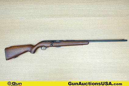 REVELATION 107 .22 MAGNUM Rifle. Good condition, Normal Handling Marks, Scattered Spotting and/or
