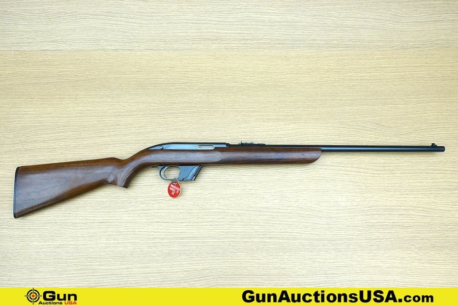 Winchester 77 .22 LR Rifle. Very Good. 22" Barrel. Shiny Bore, Tight Action Semi Auto Features: Winchester 77 .22 LR Rifle. Very Good. 22" Barrel. Shiny Bore, Tight Action Semi Auto Features Optics Ready Weaver Style Rail, Adjustable Rear Leaf Sight, Drift Adjustable Front Sight, Blued Finish, S