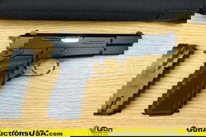 BROWNING HI-POWER 9MM LUGER Pistol. Good condition, Normal Handling Marks, Scattered Spotting and/or