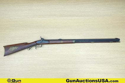 Traditions Mountain Rifle .50 Caliber Rifle. Good condition, Normal Handling Marks, Scattered