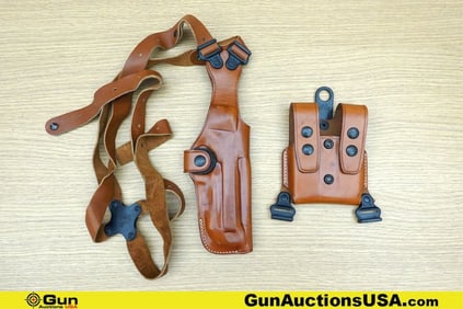 Galco Holster. Very Good. Beretta 92 Leather Shoulder Holster, with a Removable Leather Mag Pouch. .