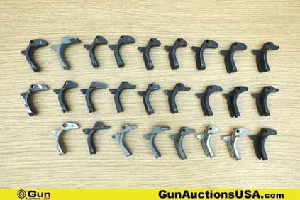 1911 Gun Parts. Good Condition. Twenty-Six Assorted 1911 Backstrap Safeties.. (76641) (GSCM34)