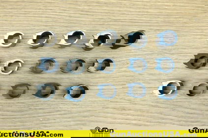 1911 Gun Parts. Good Condition. Fifteen Assorted 1911 Barrel Bushings. (76671) (GSCM90)