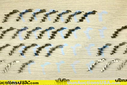 1911 Gun Parts. Good Condition. Twenty-Six Assorted 1911 Backstrap Safeties.. (76635) (GSCM69)