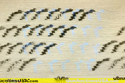 1911 Gun Parts. Good Condition. Twenty-Six Assorted 1911 Backstrap Safeties.. (76642) (GSCM73)