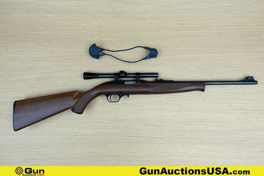 MOSSBERG 702 PLINKSTER .22 LR Rifle. Very Good. 18" Barrel. Shiny Bore, Tight Action Semi Auto: MOSSBERG 702 PLINKSTER .22 LR Rifle. Very Good. 18" Barrel. Shiny Bore, Tight Action Semi Auto Features Hooded Front Sight, Fully Adjustable Rear Sight, Scope with Cross Hair Reticle, Polymer Wood Sty