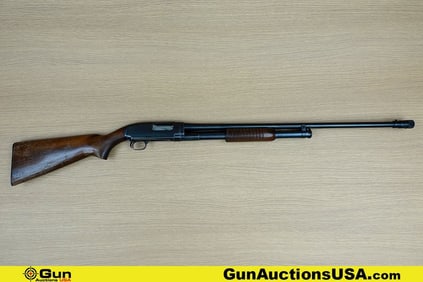 Winchester 12 20 ga. TAKE DOWN Shotgun. Good condition, Normal Handling Marks. 28" Barrel. Shiny
