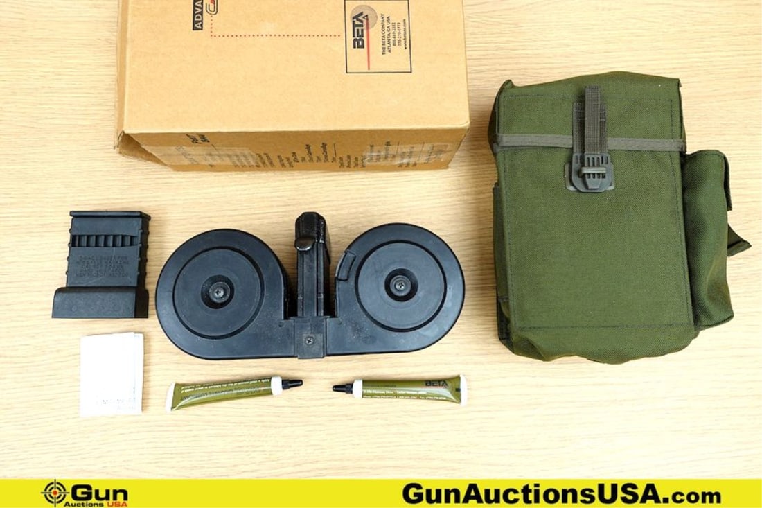 THE BETA COMPANY AR15 BETA MAG 5.56 COLLECTOR'S Magazine. Excellent. One 100 Rd Magazine. Includes: THE BETA COMPANY AR15 BETA MAG 5.56 COLLECTOR'S Magazine. Excellent. One 100 Rd Magazine. Includes Factory OD Pouch. Dry Film Lube, Loading Tool and Original Box. COLLECTOR'S TAKE NOTICE. . (78323) (G
