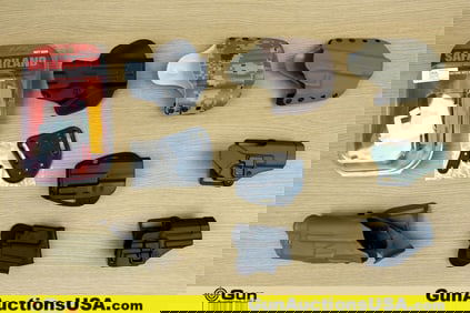 Safari Land, Black Hawk, Springfield, Etc. Holsters. Very Good. Eight Polymer, Assorted OWB
