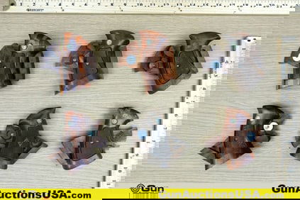 S&W COLLECTOR'S Grips. Good Condition. Six S&W Checkered Wood Grips with S&W Medallions.. (78057)