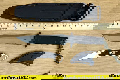 SOG GAMBIT, Etc. Knives . Very Good. One Stainless, Carambit,Fixed Blade Knife with a Belt Sheath