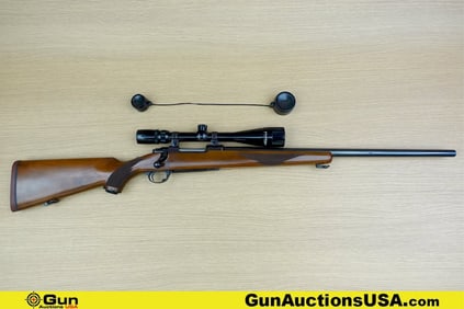 RUGER M77 243 WIN Rifle. Excellent. 24" Barrel. Shiny Bore, Tight Action Bolt Action Features a BULL