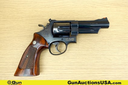 S&W 25-5 .45 COLT Revolver. Very Good. 4 1/8" Barrel. Shiny Bore, Tight Action Features a BEAUTIFUL