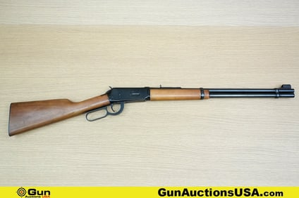 Winchester 94 30-30 Rifle. Good condition, Normal Handling Marks, Scattered Spotting and/or Pitting.