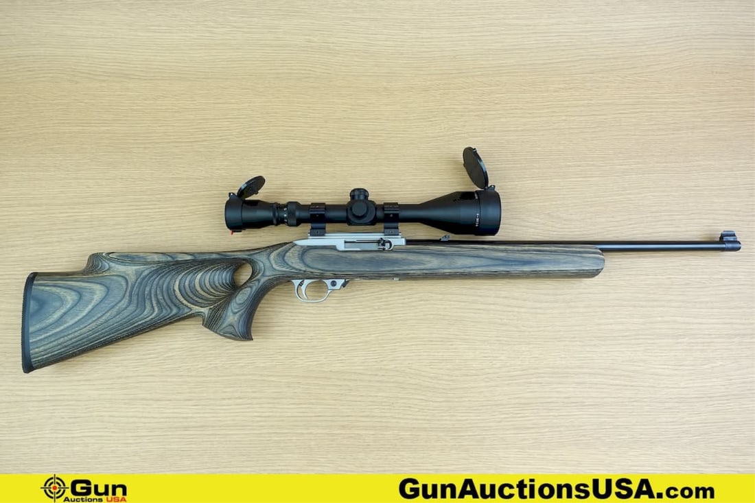 RUGER 10/22 CARBINE .22 LR RIFLE. Excellent. 18.5" Barrel. Shiny Bore, Tight Action Semi Auto: RUGER 10/22 CARBINE .22 LR RIFLE. Excellent. 18.5" Barrel. Shiny Bore, Tight Action Semi Auto STUNNING with Drift Adjustable Front and Rear Sight, with a 3-9x50 Scope with Leupold and Butler Creek Len