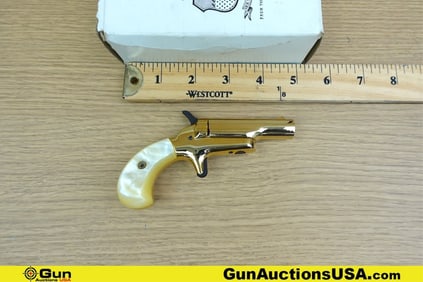 BUTLER ASSOC., INC. DERRINGER GOLD .22 Short Derringer Pistol. Very Good. 2.5" Barrel. Shiny Bore,