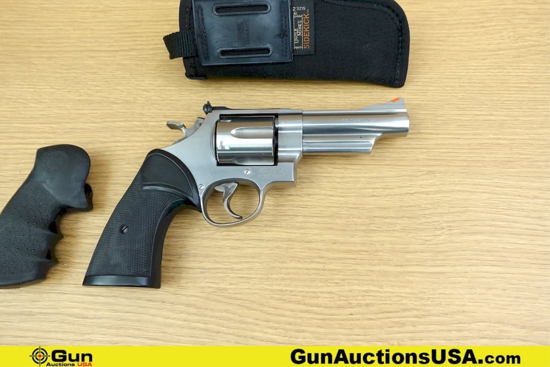 S&W 629-4 .44 MAGNUM Revolver. Very Good. 4" Barrel. Shiny Bore, Tight Action Features a Stainless: S&W 629-4 .44 MAGNUM Revolver. Very Good. 4" Barrel. Shiny Bore, Tight Action Features a Stainless Barrel, Frame, and Six Shot Fluted Cylinder, Serrated Ramped Front Sight, Pachmayr Rubber Grips, Shro