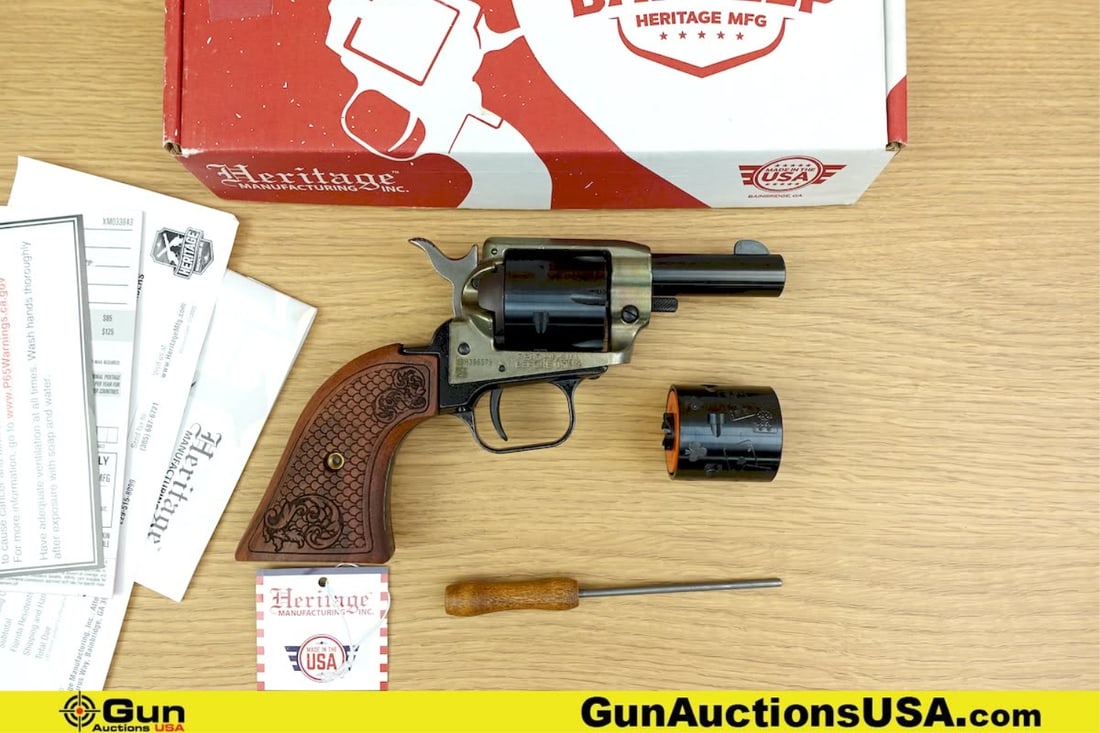 Heritage MFG BARKEEP .22 CAL Revolver. Like New . 2 5/8" Barrel. Features a Fixed Front Sight,: Heritage MFG BARKEEP .22 CAL Revolver. Like New . 2 5/8" Barrel. Features a Fixed Front Sight, Trench Style Rear sight, Serrated SA Only Hammer, with Checkered Wood Grips. A Installed .22LR Fluted 6 R