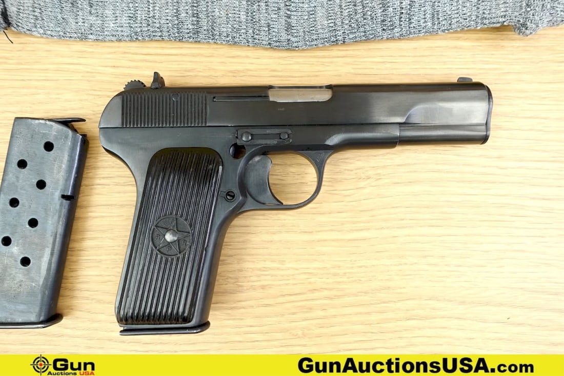 CUGIR TT-C 7.62 X 25 WWII CLASSIC Pistol. Good Condition . 4.5" Barrel. Shiny Bore, Tight Action: CUGIR TT-C 7.62 X 25 WWII CLASSIC Pistol. Good Condition . 4.5" Barrel. Shiny Bore, Tight Action Semi Auto MATCHING NUMBERS on Frame and Slide. Features a Fixed Front Sight, Drift Adjustable Rear Sigh