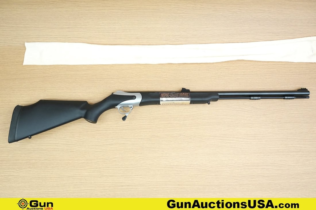 THOMPSON CENTER TRIUMPH .50 Caliber Rifle. Very Good. 27.5" Barrel. Muzzle Loader Features a: THOMPSON CENTER TRIUMPH .50 Caliber Rifle. Very Good. 27.5" Barrel. Muzzle Loader Features a Fiberoptic Front and Rear Sight, Blued Barrel Drilled and Tapped For Optics. Full Length Alloy Loading Rod,