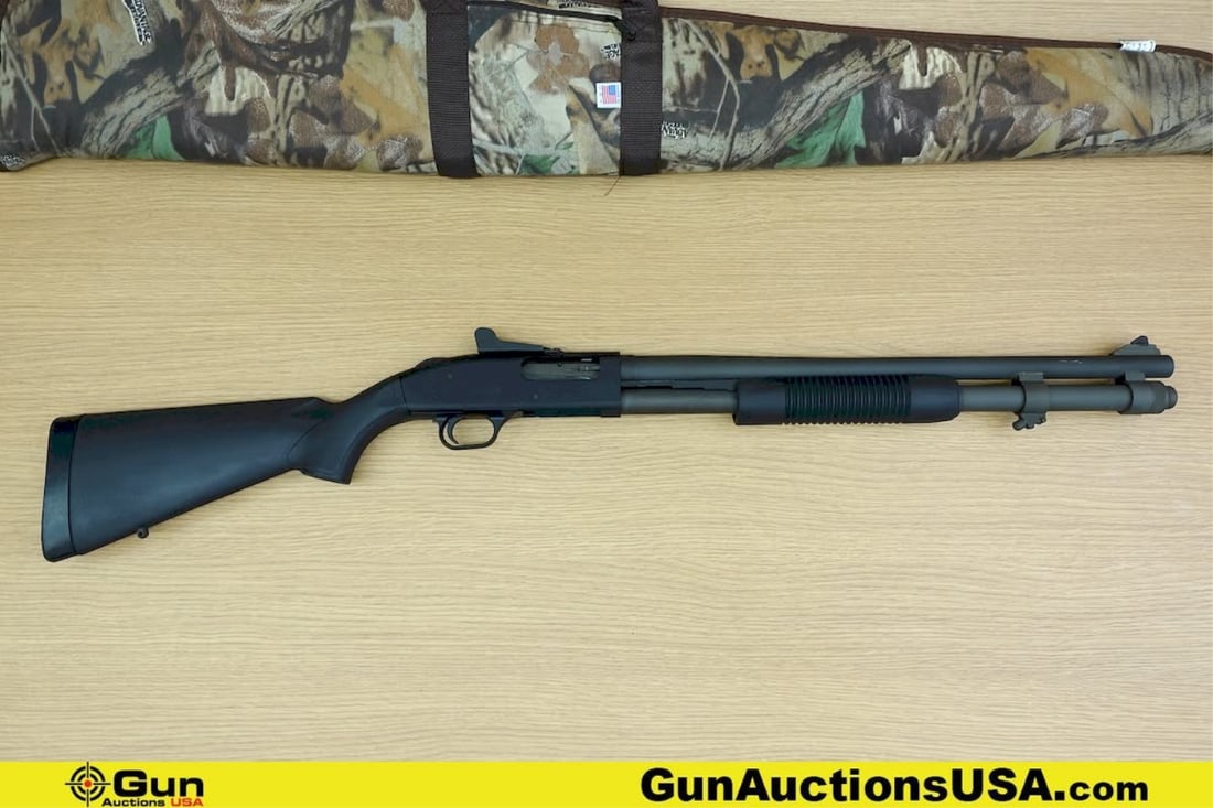 Mossberg 590 12 ga. Shotgun. Good condition, Normal Handling Marks, Scattered Spotting and/or: Mossberg 590 12 ga. Shotgun. Good condition, Normal Handling Marks, Scattered Spotting and/or Pitting. 20" Barrel. Shiny Bore, Tight Action Pump Action SHOTGUN BUILT FOR MARINES with Parkerized Steel 