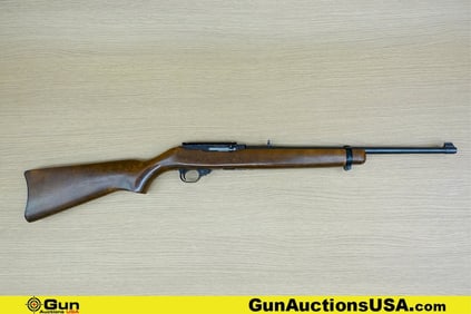 RUGER 10/22 .22 LR Rifle. Good condition, Normal Handling Marks, Scattered Spotting and/or Pitting.
