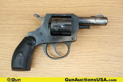 H&R INC 900 .22 CAL Revolver. Good condition, Normal Handling Marks, Scattered Spotting and/or