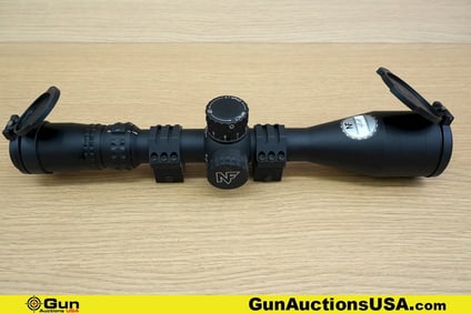 NIGHTFORCE NX8 F1 Scope . Very Good. One 4-32x50 MRAD Scope, with Flip Up Lens Cover and Scope