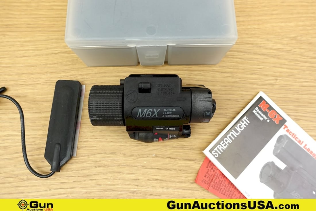 Streamlight/Insight M6X Light/Laser Combo. Like New . One Insight Pistol Mounted Light and Laser: Streamlight/Insight M6X Light/Laser Combo. Like New . One Insight Pistol Mounted Light and Laser Combo with Original Box and Papers. . (78457) (GSCN36)
