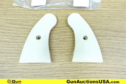 Altamont Grips. Excellent. One Set of BONDED IVORY, COLT D Frame, CLASSIC Paneled Checkered Grips. .