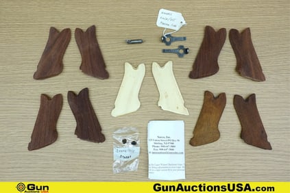 Luger, Etc. COLLECTOR'S Grips. Very Good. Five Luger Grips: Four Brown and one White. . (78060)