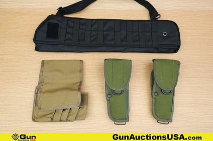 Tuff, Bianchi, Etc. Holsters, Etc. . Very Good. Three Nylon Holsters, and One Nylon Admin Pouch. .