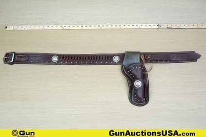 La Flair Belt/Holster. Very Good. One Leather Gun Belt and Holster.( 35"-41"). (79733) (GSCN90)