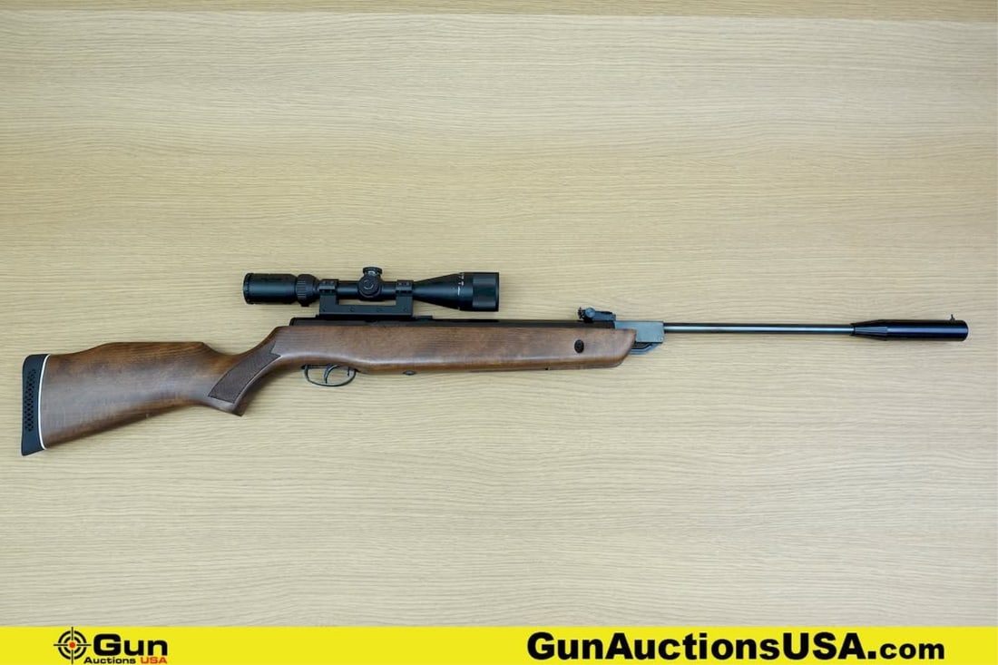 GAMO HUNTER 1250 .177 Rifle. Very Good. 20" Barrel. SPRING POWERED BB Features a Fixed Front Sight,: GAMO HUNTER 1250 .177 Rifle. Very Good. 20" Barrel. SPRING POWERED BB Features a Fixed Front Sight, Target Adjustable Rear Sight, Receiver Cut for Accessory Rails and Weaver Style Mounts. Crossman 3-9