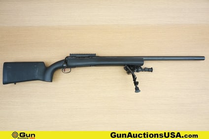 SAVAGE 12 260 REM. JEWELED BOLT Rifle. Good condition, Normal Handling Marks, Scattered Spotting